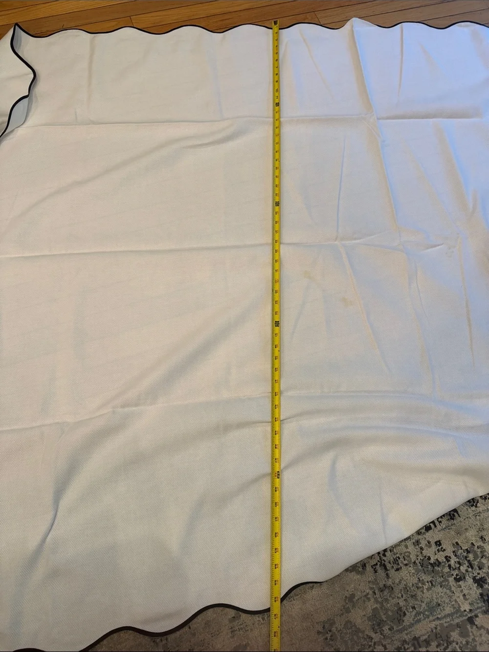 White vintage Scalloped Edge table cloth 113”x57” with matching napkins.